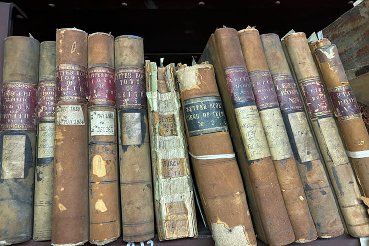 An image of archival books to celebrate International Archives Day on 9th June.